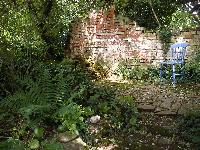  Blue chair in Dora's - Aulden. Dora delivered the milk to this tiny ruin during WW2 when it was someone's home. 
